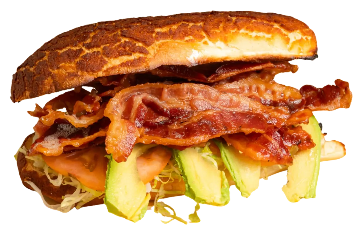 BLTA sandwich piled with crispy bacon, tomatoes, and sliced avocado